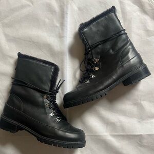 Stuart weitzman Luge Boot in black leather and faux fur detail